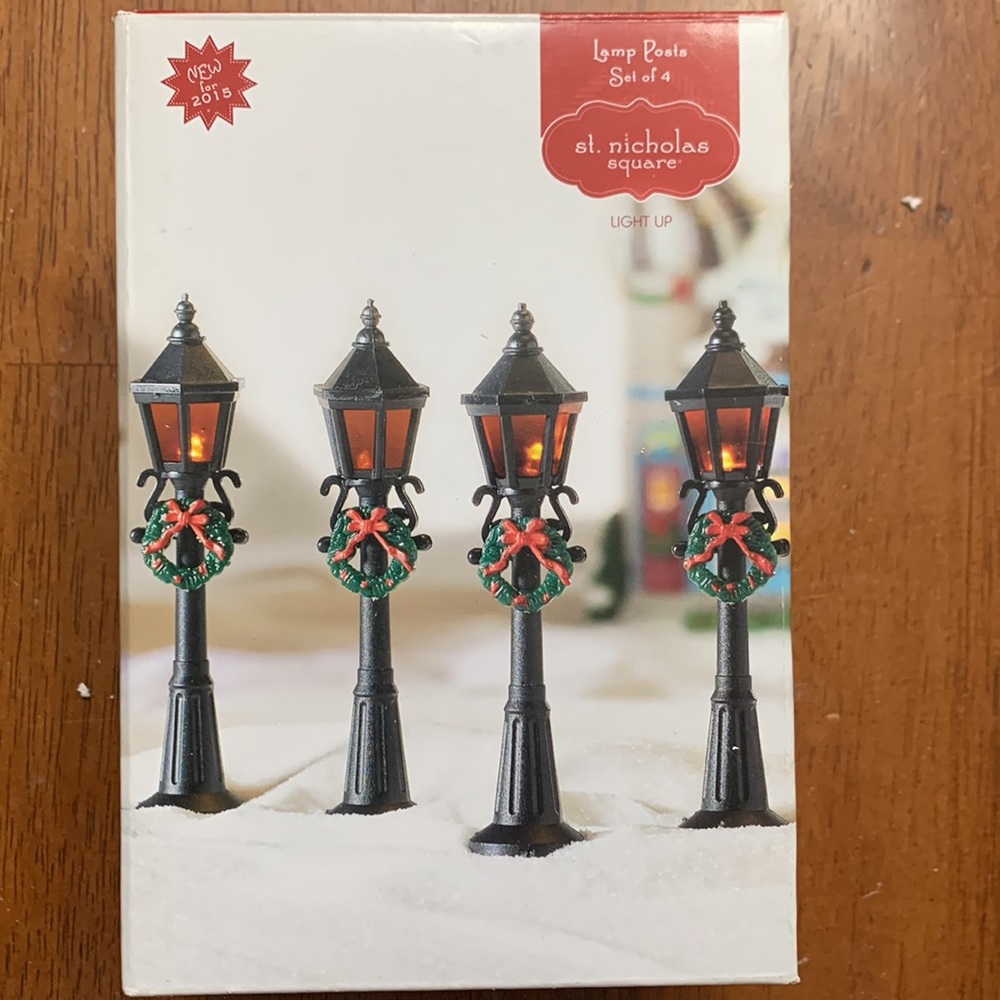 St. Nicholas Square Christmas Village Set of 4 Light Up Lamp Posts